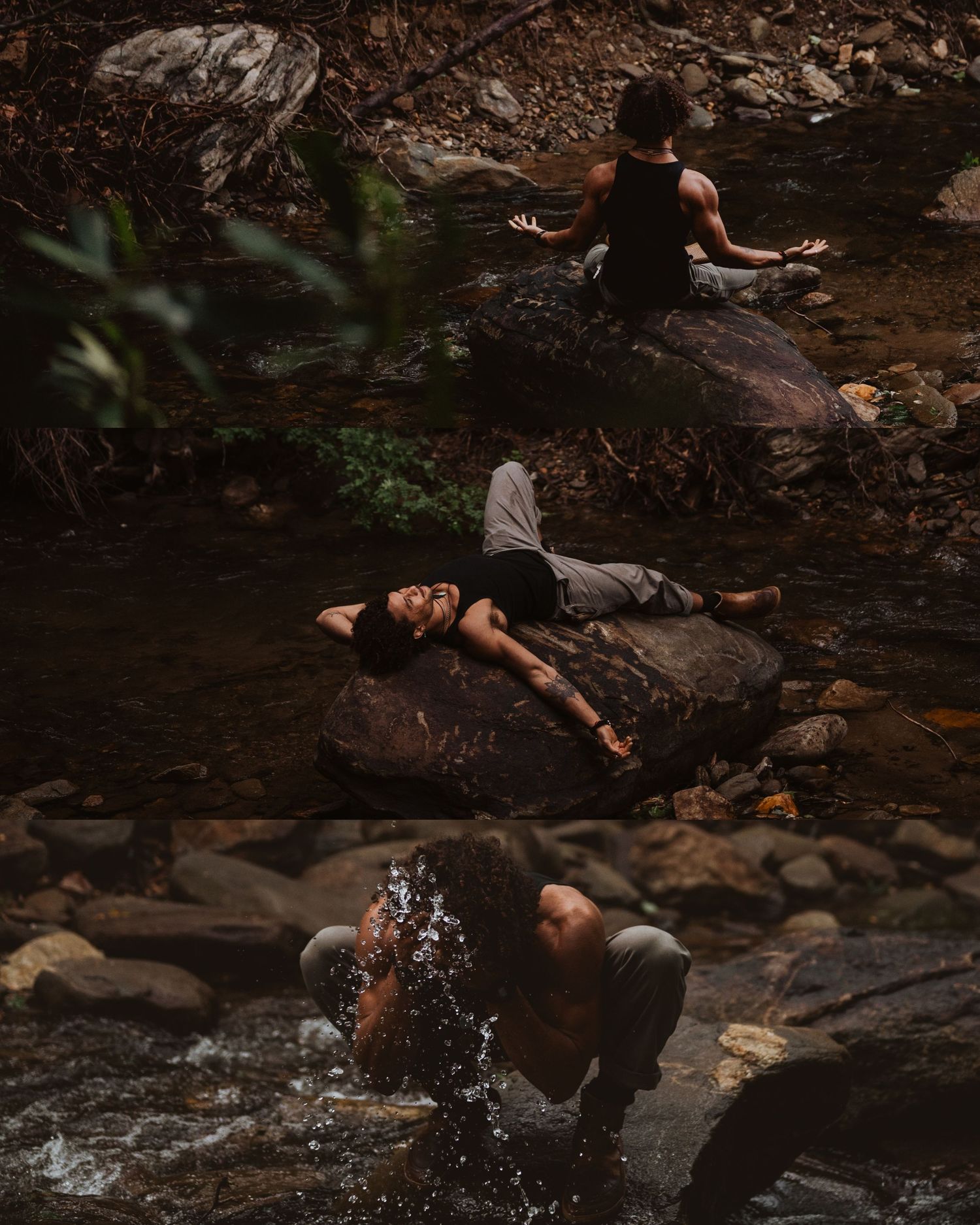 Person crouches by a rocky stream in a dark forest setting, touching the flowing water amid mossy stones.