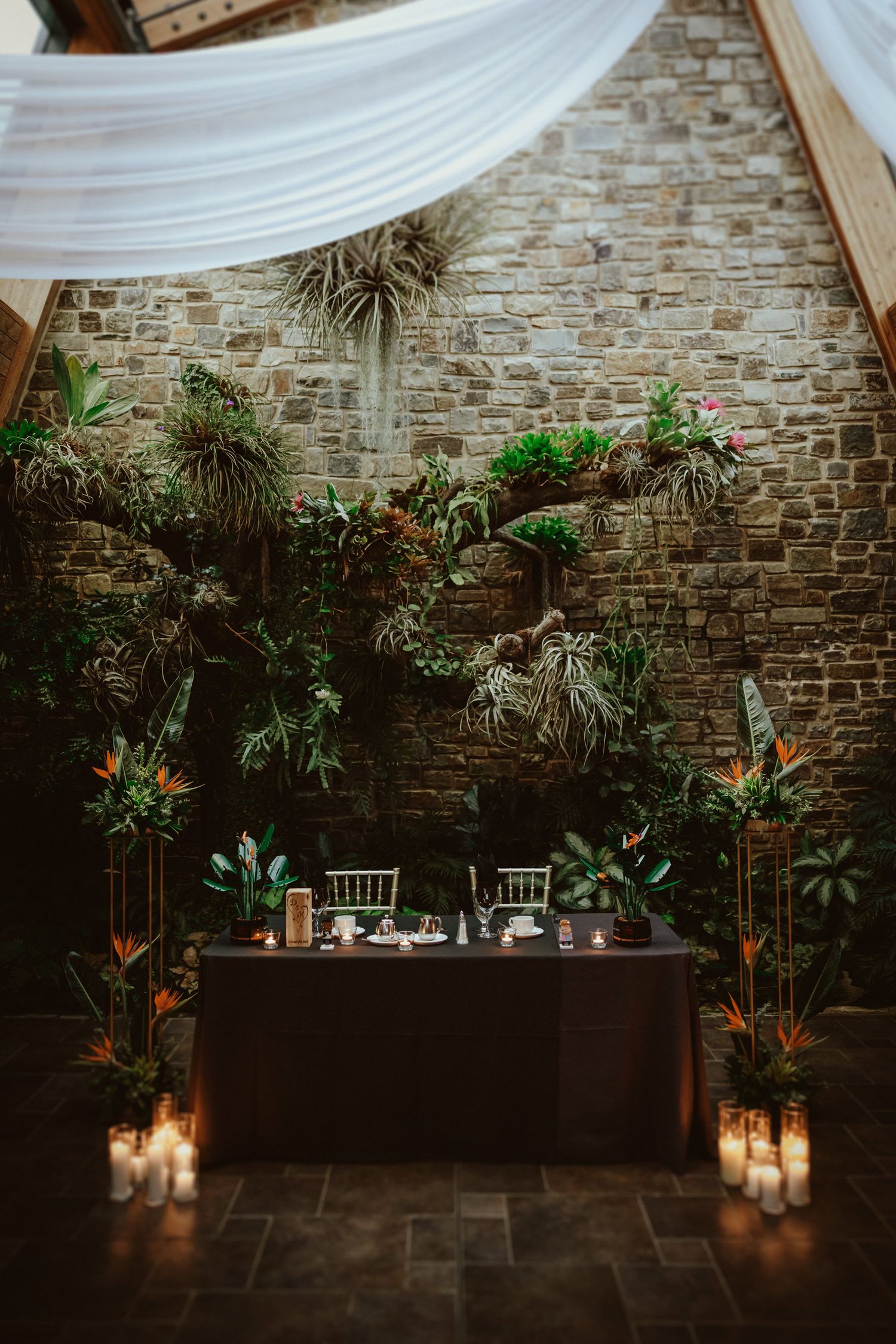Elegant sweetheart table setup at a Calgary Zoo ENMAX Conservatory wedding reception. Perfect for couples seeking a unique Calgary wedding