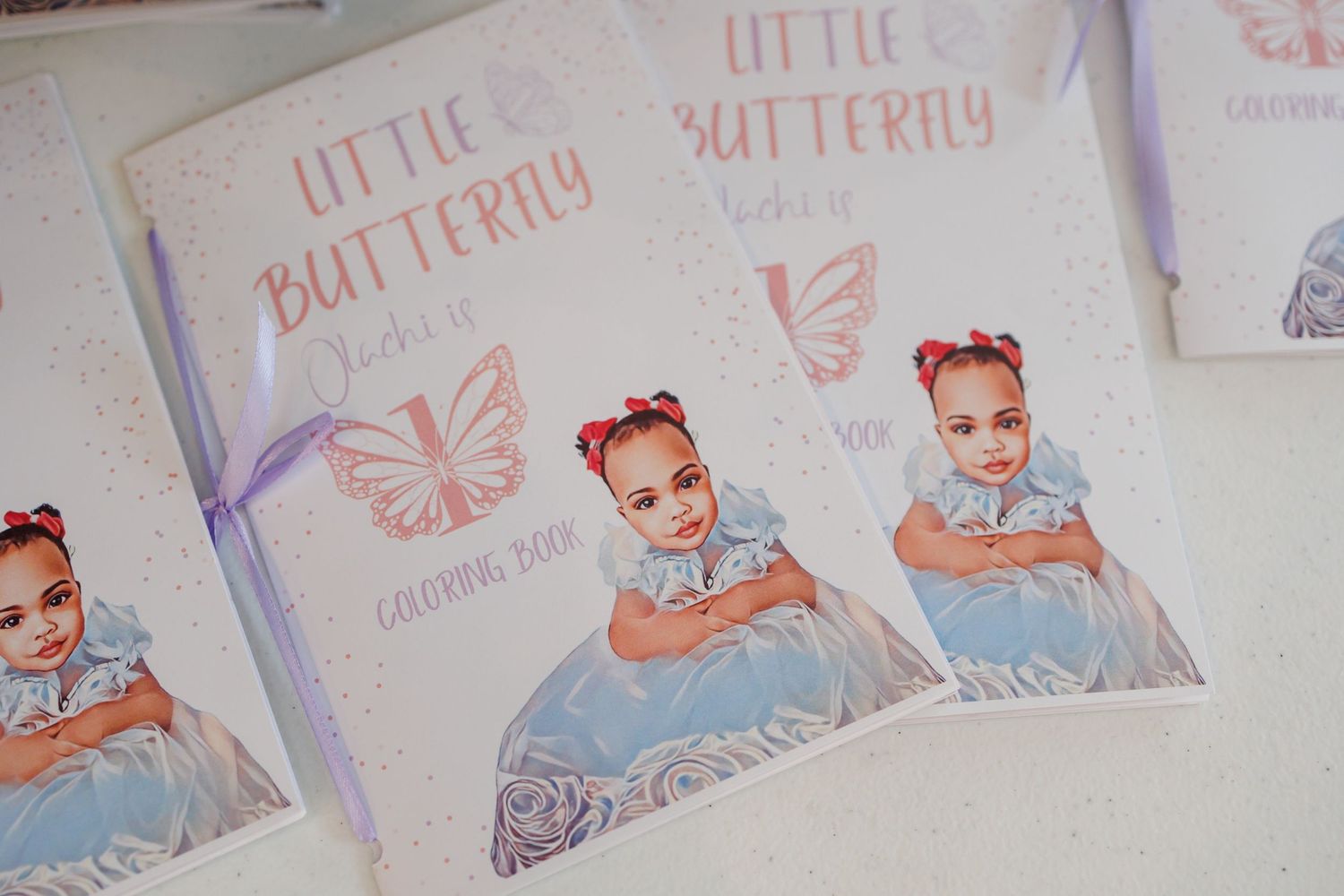 A series of butterfly-themed coloring book covers featuring the birthday girl's portrait