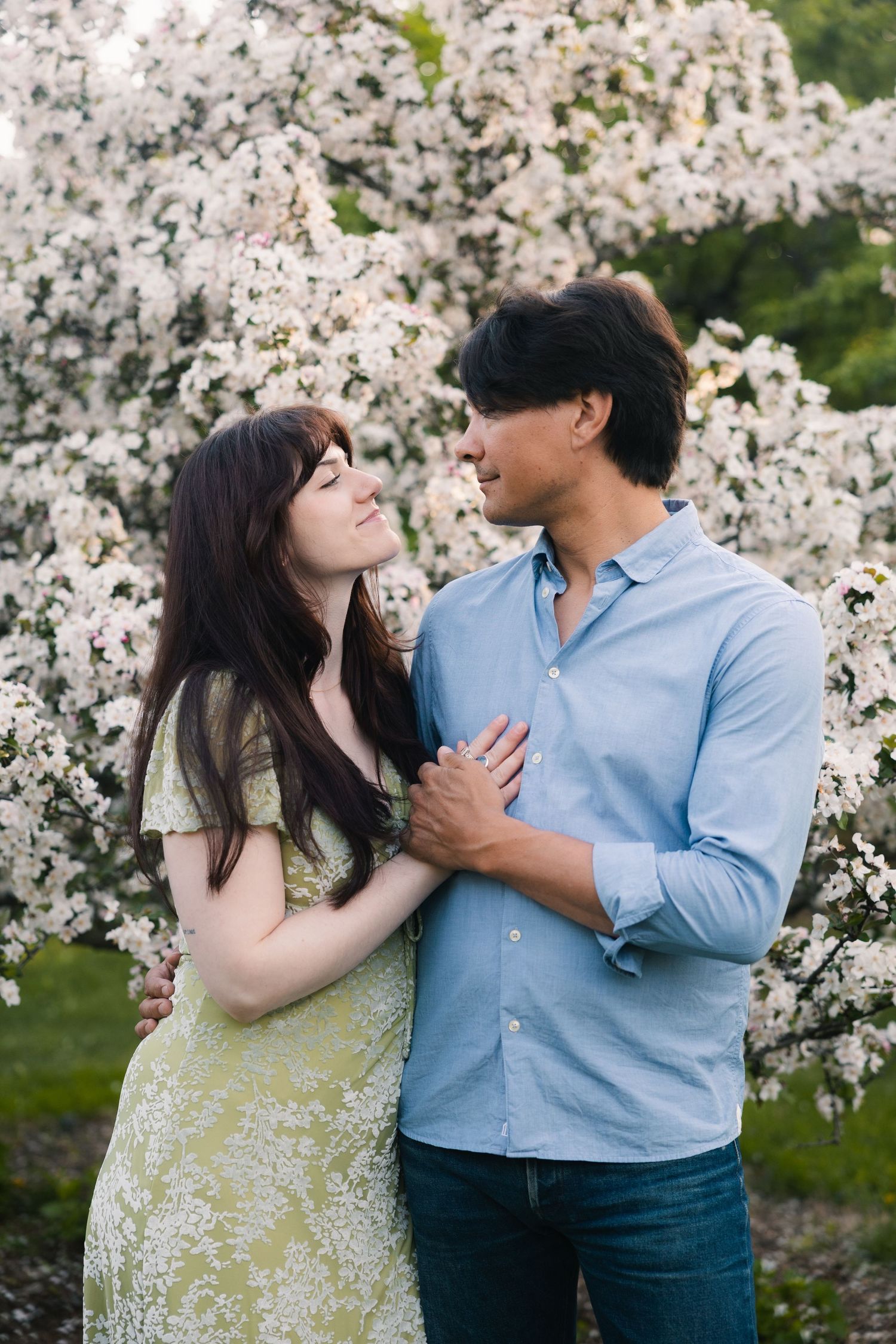 madison wi engagement couple photoshoot professional photographer spring uw arboretum cherry blossom trees lilacs middleton verona deforest