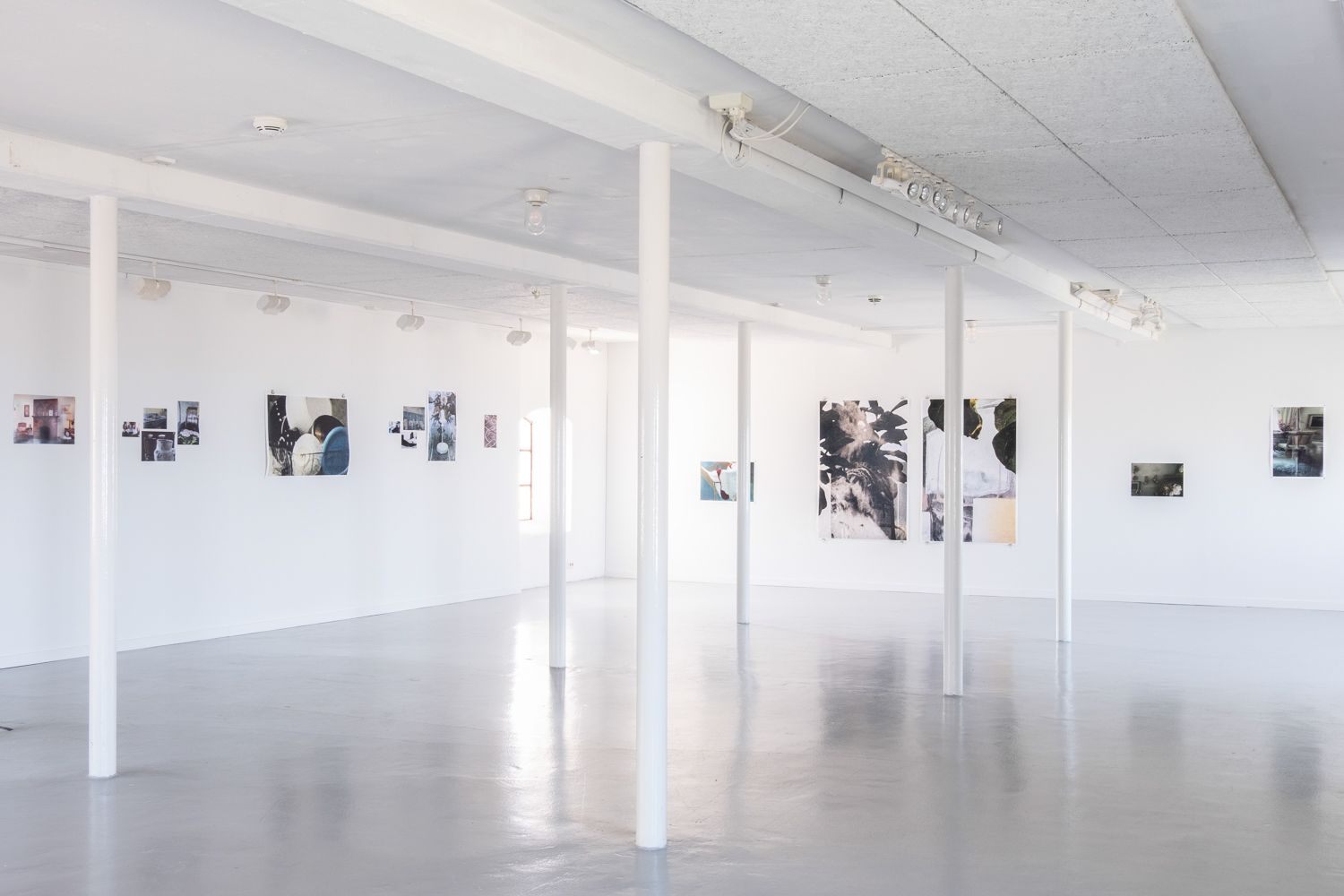 Several prints in various sizes tacked on walls at Hå gamle prestegard, Sept–Nov 2022 exhibition by Dan Skjæveland.