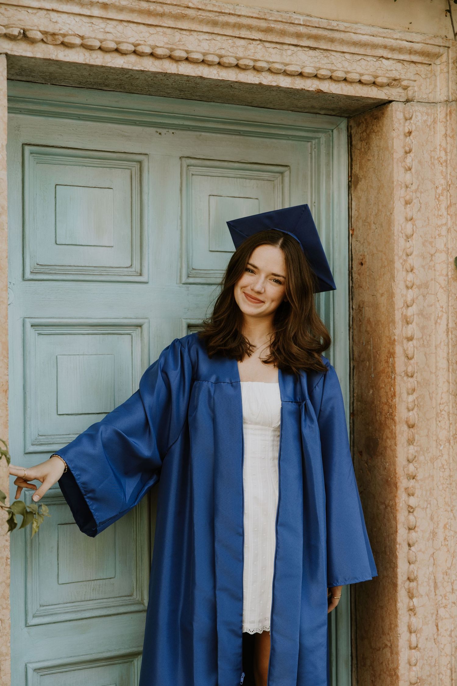 Senior graduation photos on Palm Beach Island off of Major Alley captured by Lindsay McDow Photography