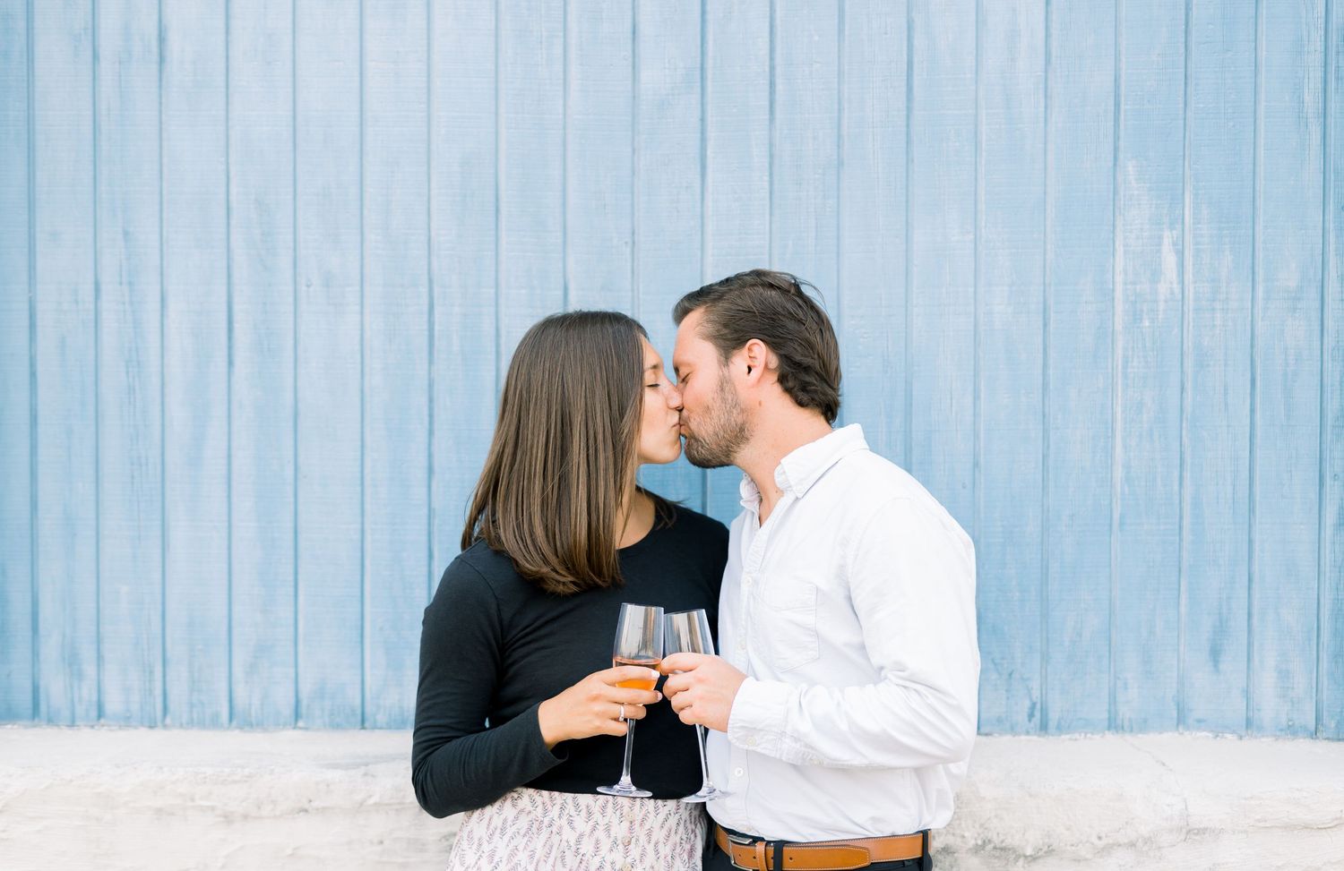Des Moines Engagement photos in downtown Des Moines, Iowa with light and airy photographer Nicole Laing