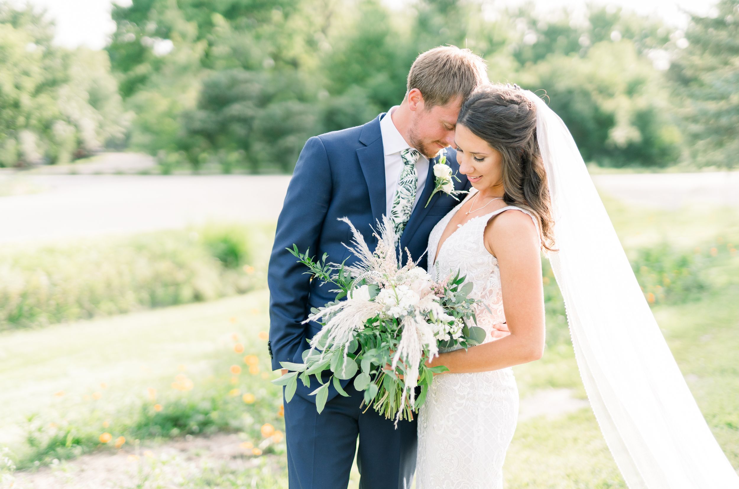 Vineyard photos with white willow events at Prairie Moon Winery wedding in Ames, Iowa