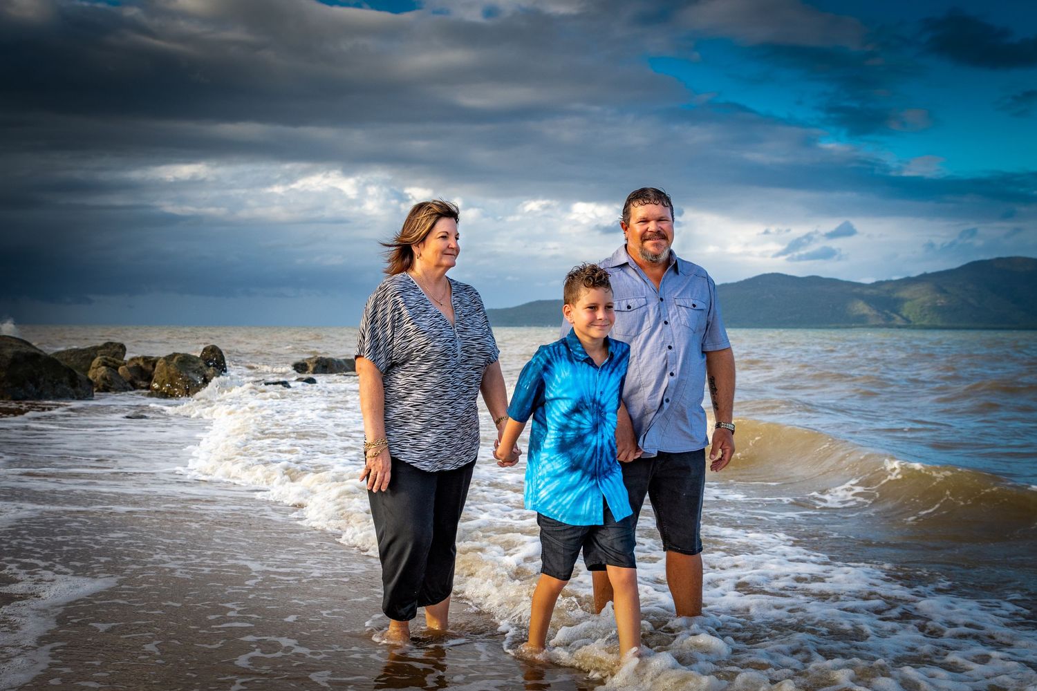 Family Walking along the beach in Townsville