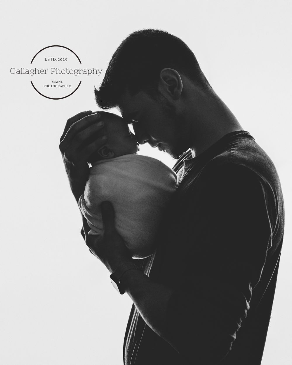 Professional newborn photo with dad