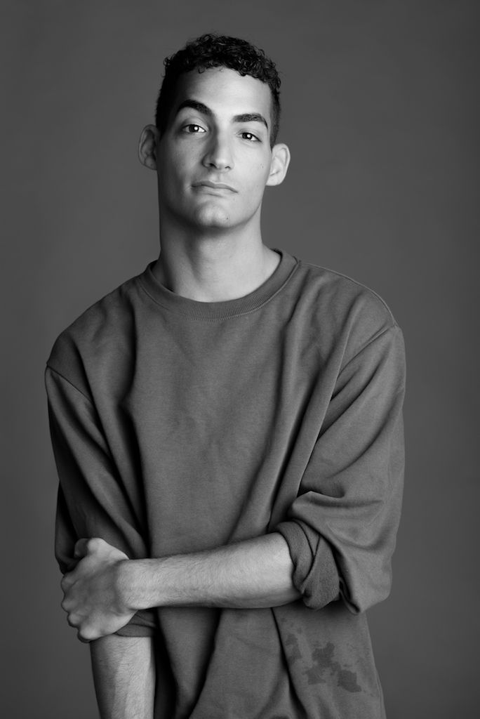 Dancer actor Sam Routley headshot against grey background in studio by Caribbean Photographer by Logan C Thomas Barbados