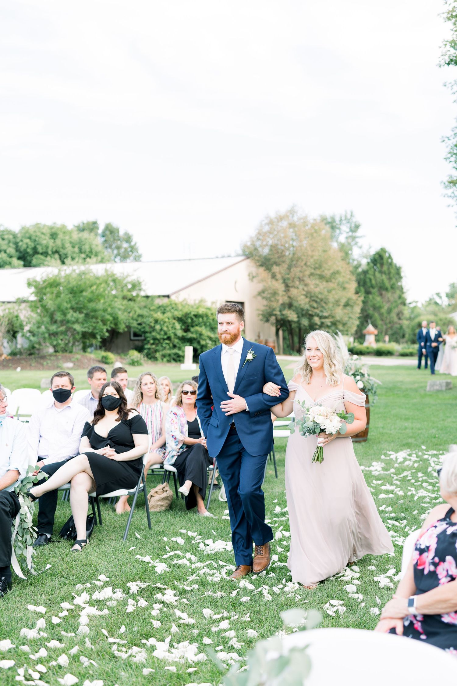 Vineyard photos with white willow events at Prairie Moon Winery wedding in Ames, Iowa