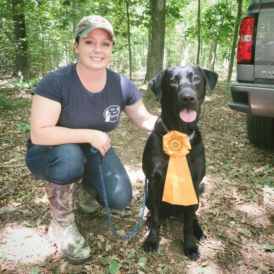 Kate Lussier CT Photographer at a hunt test with her Lab