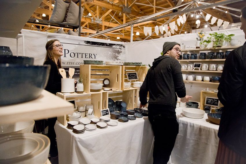 Pinology Puyallup D Pottery hand made ceramics owner and wife interacting with customers