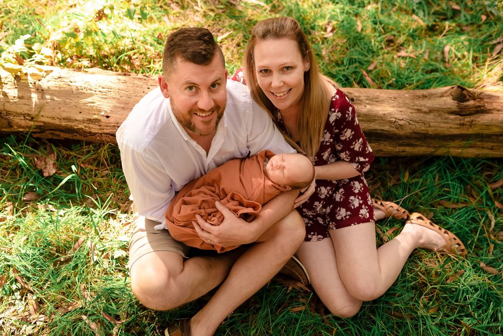 Parents and newborn in Melbourne forest