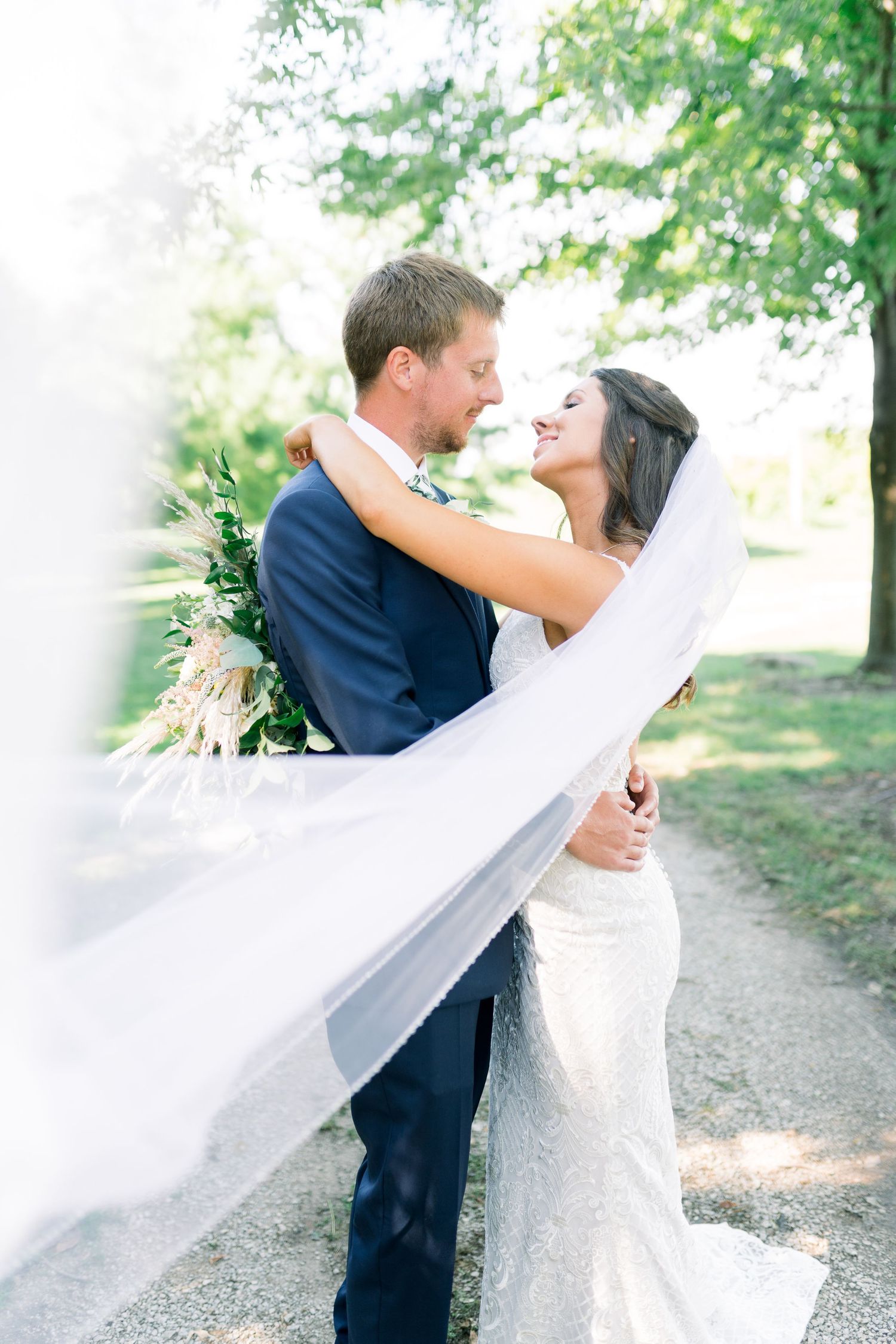 Vineyard photos with white willow events at Prairie Moon Winery wedding in Ames, Iowa