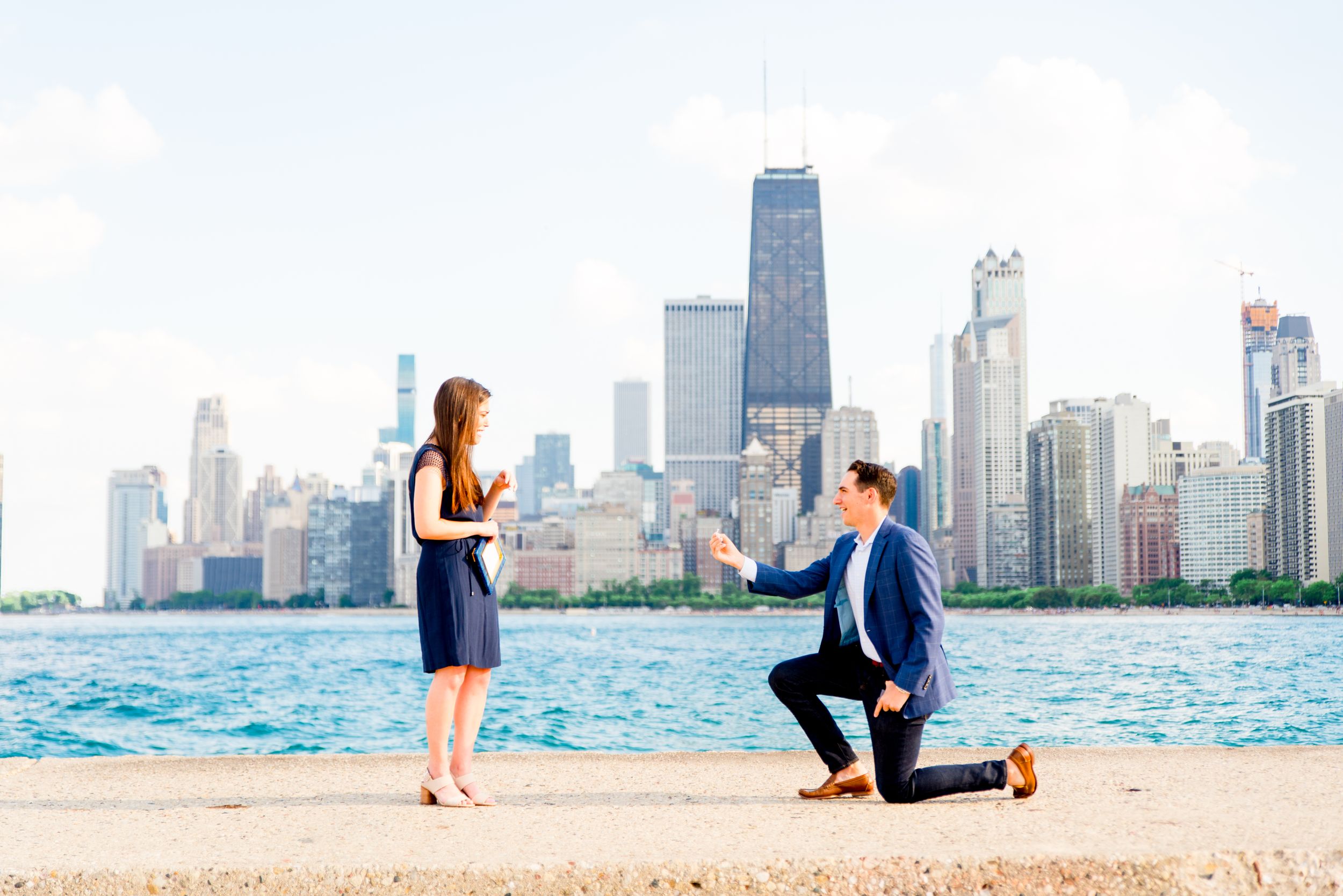 man proposing to girlfriend at North Avenue Beach