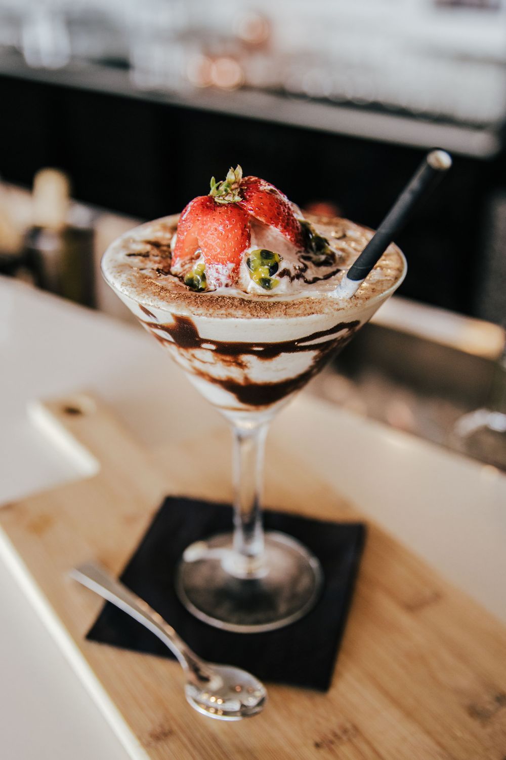 dessert cocktail with strawberries on top