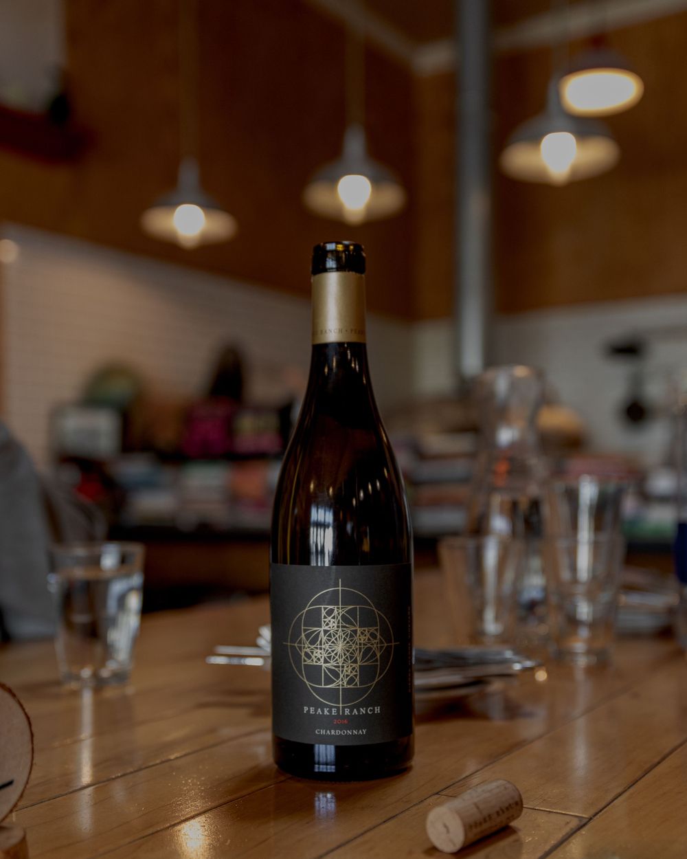 Bottle photo of peake ranch chardonnay at a restaurant in santa barbara wine country