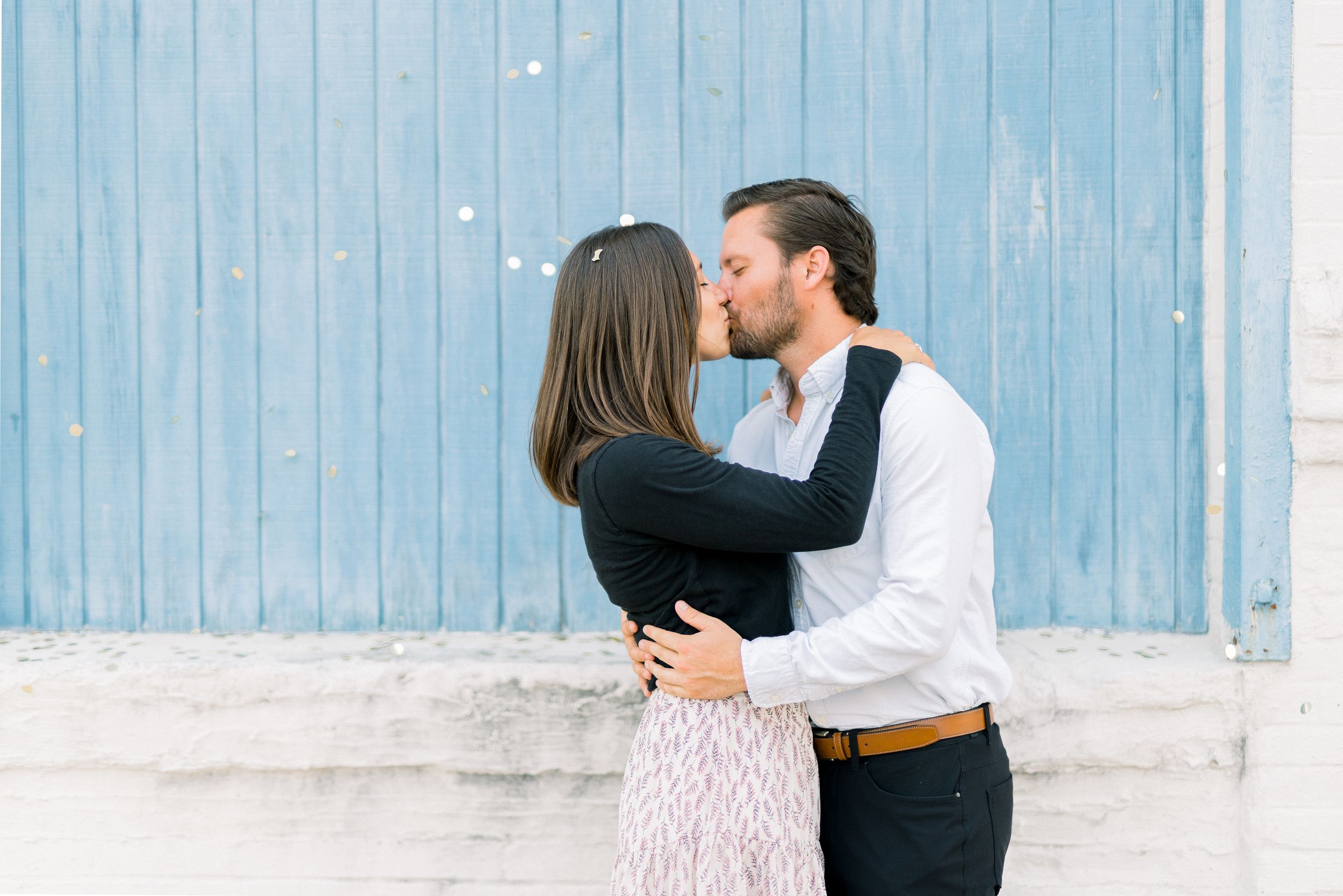 Des Moines Engagement photos in downtown Des Moines, Iowa with light and airy photographer Nicole Laing