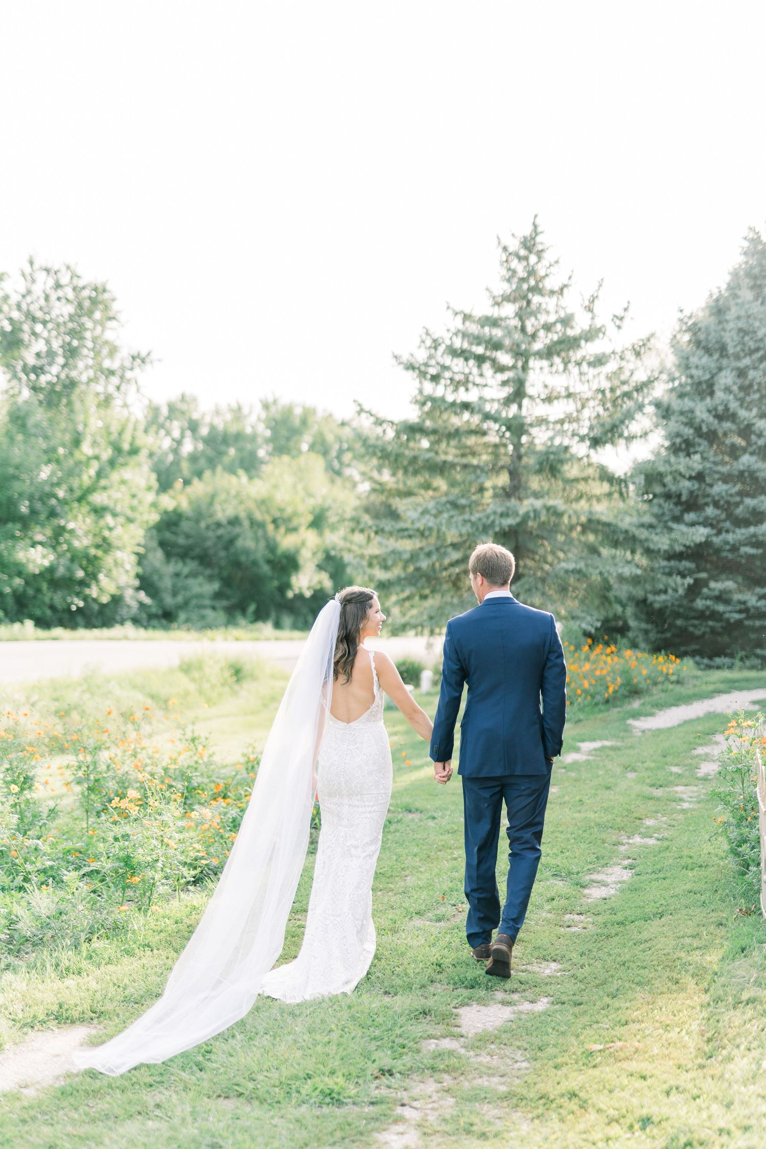 Vineyard photos with white willow events at Prairie Moon Winery wedding in Ames, Iowa