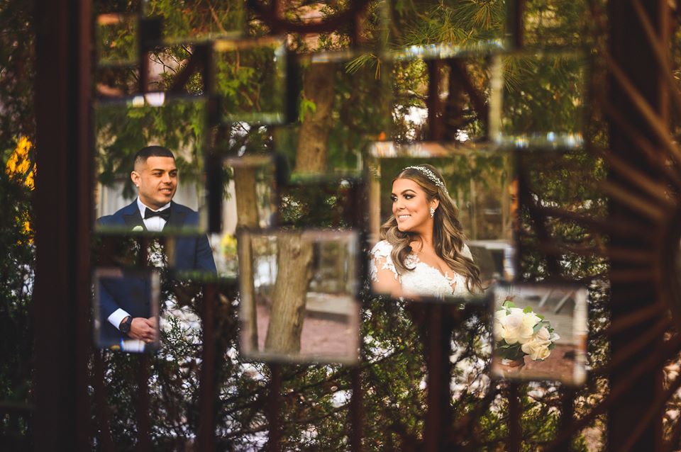refelctive mirror bride and groom portrait at stone house at stirling ridge