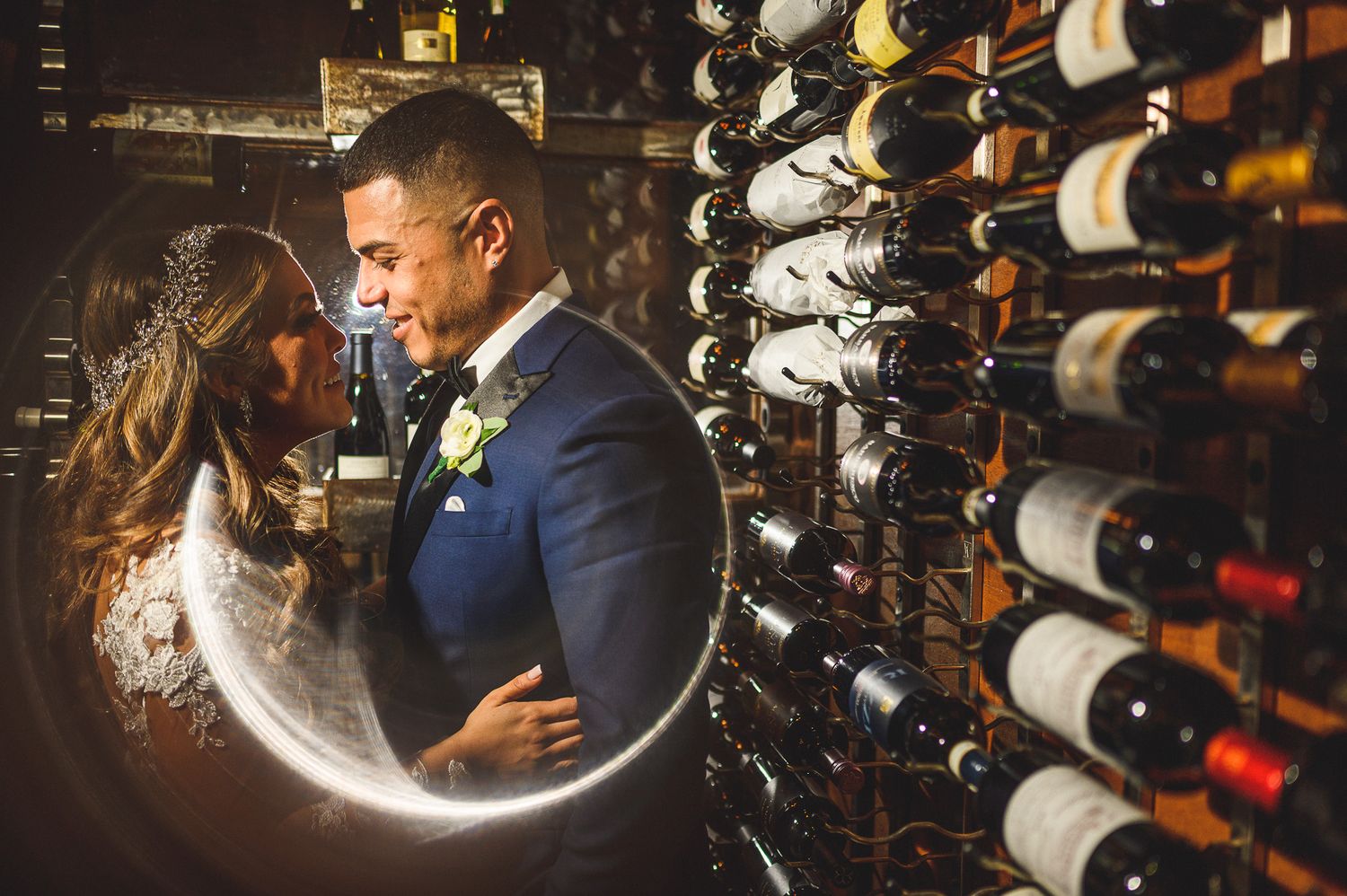 bride and groom wine portrait at stone house