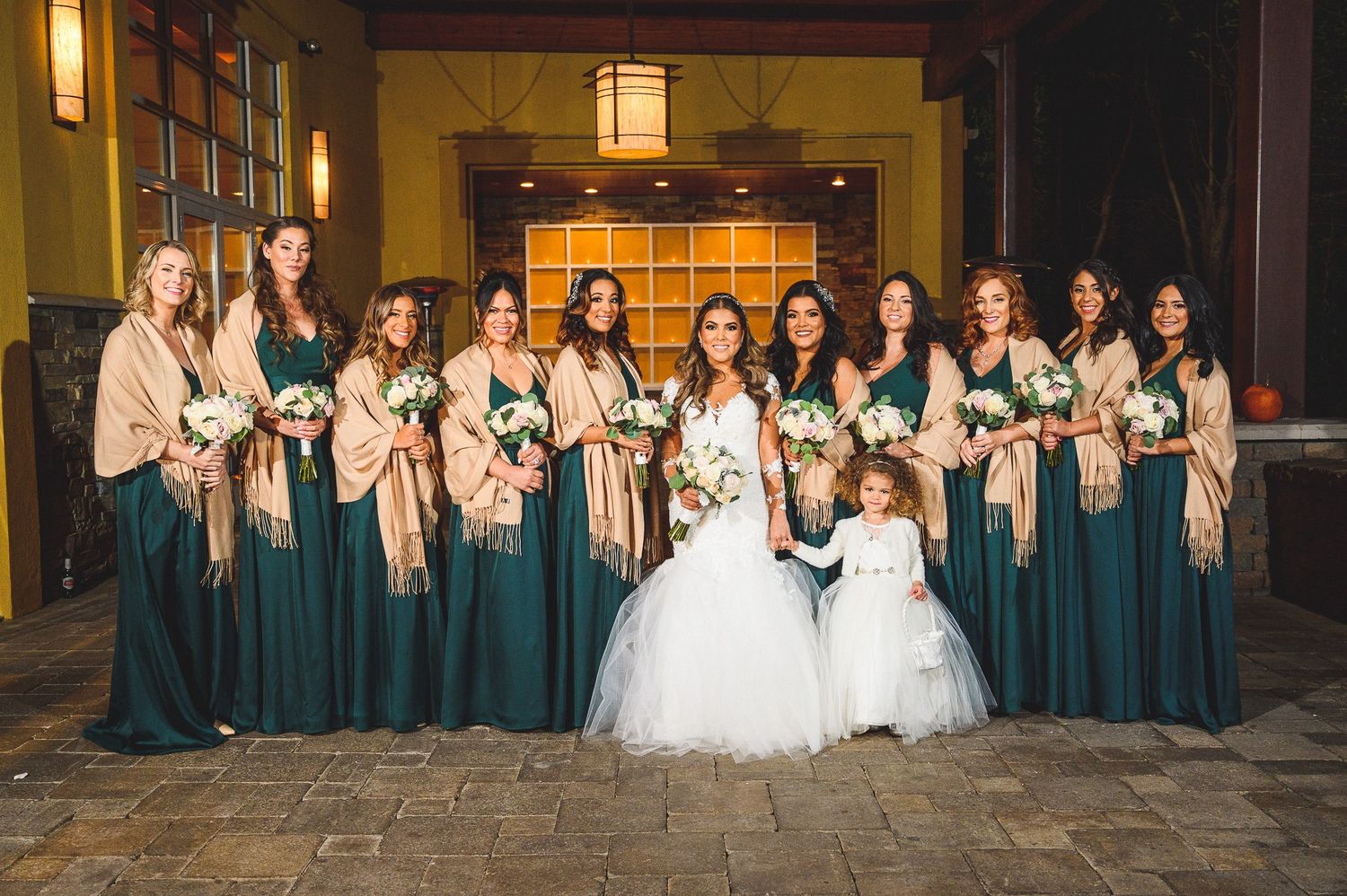 bridal party portrait at stone house at stirling ridge