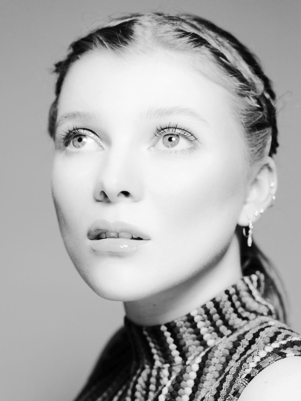High key image of a young model looking up