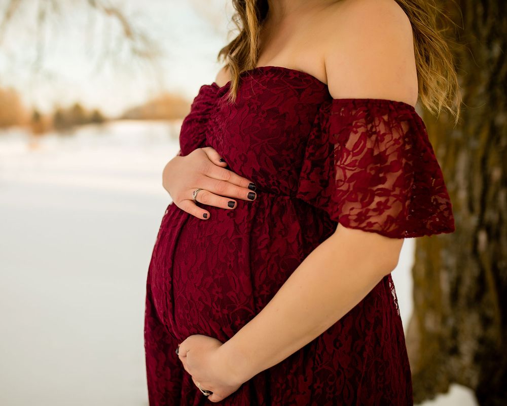 Snowy Winter Maternity Photo Session in Omaha, NE - BrightSide Photography