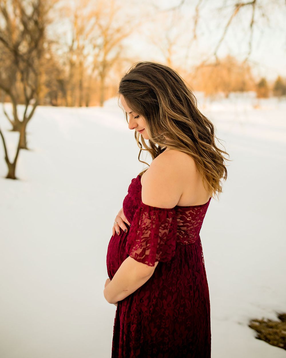 Snowy Winter Maternity Photo Session in Omaha, NE - BrightSide Photography