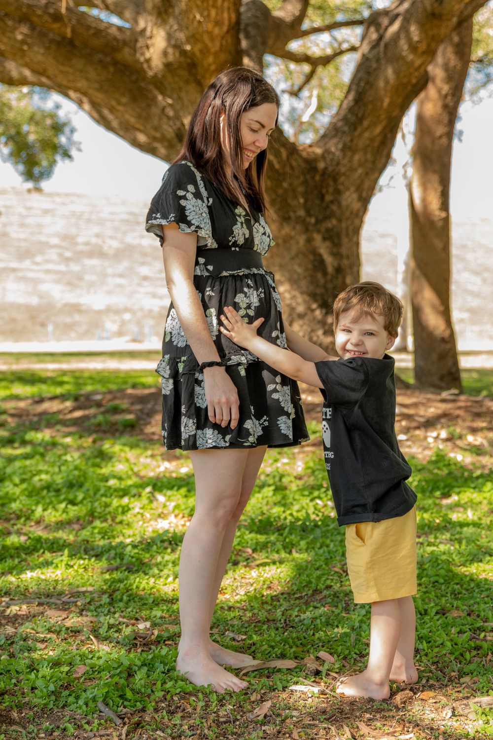 pregnancy reveal, family of 3