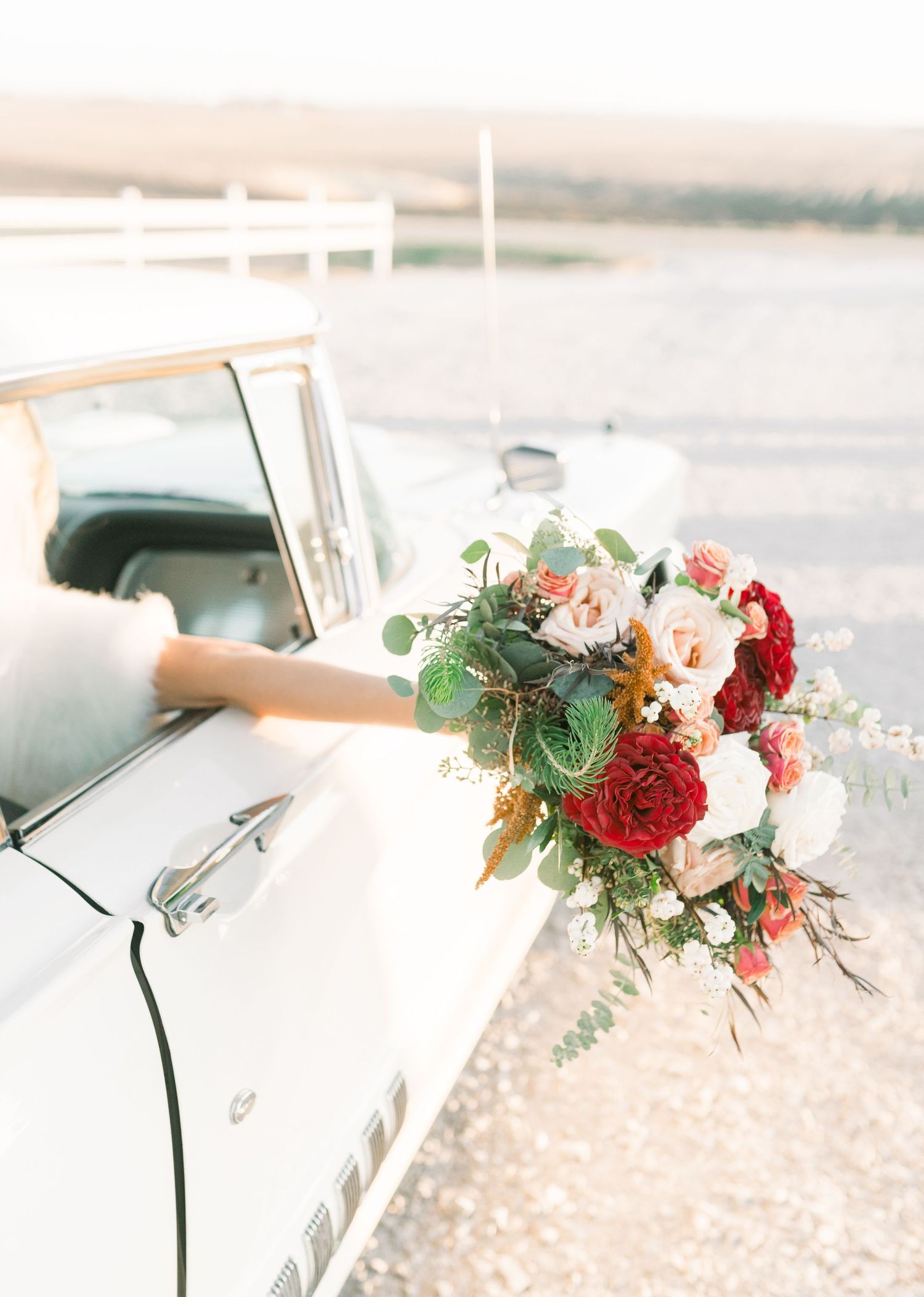 winter wedding at 1868 Farmhouse Wedding in Boone, Iowa with Modern Dress bridal gown