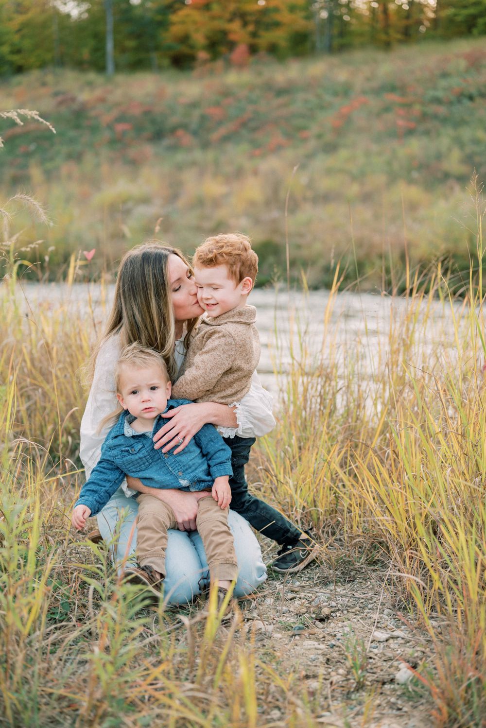 A warm embrace among the golden autumn grass and rolling hills.