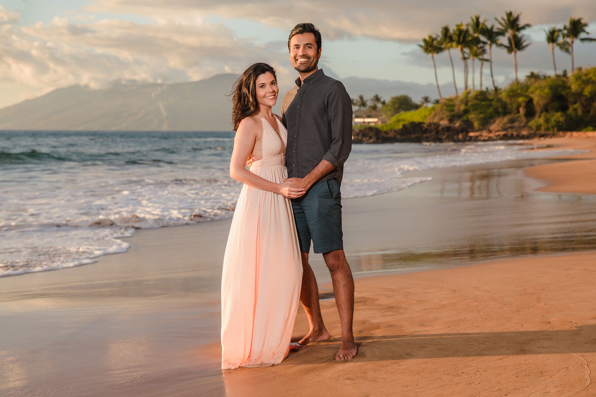Couple on Po'olenalena Beach for sunset photos