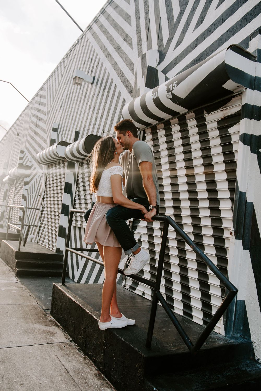 couple kissing during their south Florida engagement