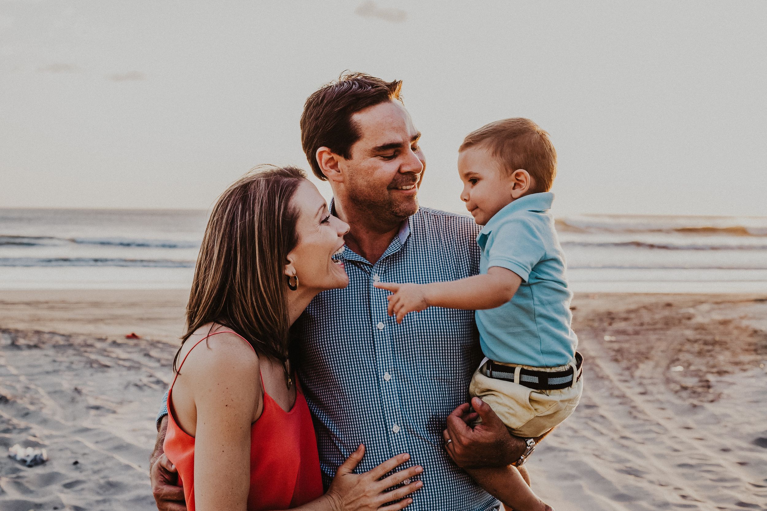 Family of three on the beach