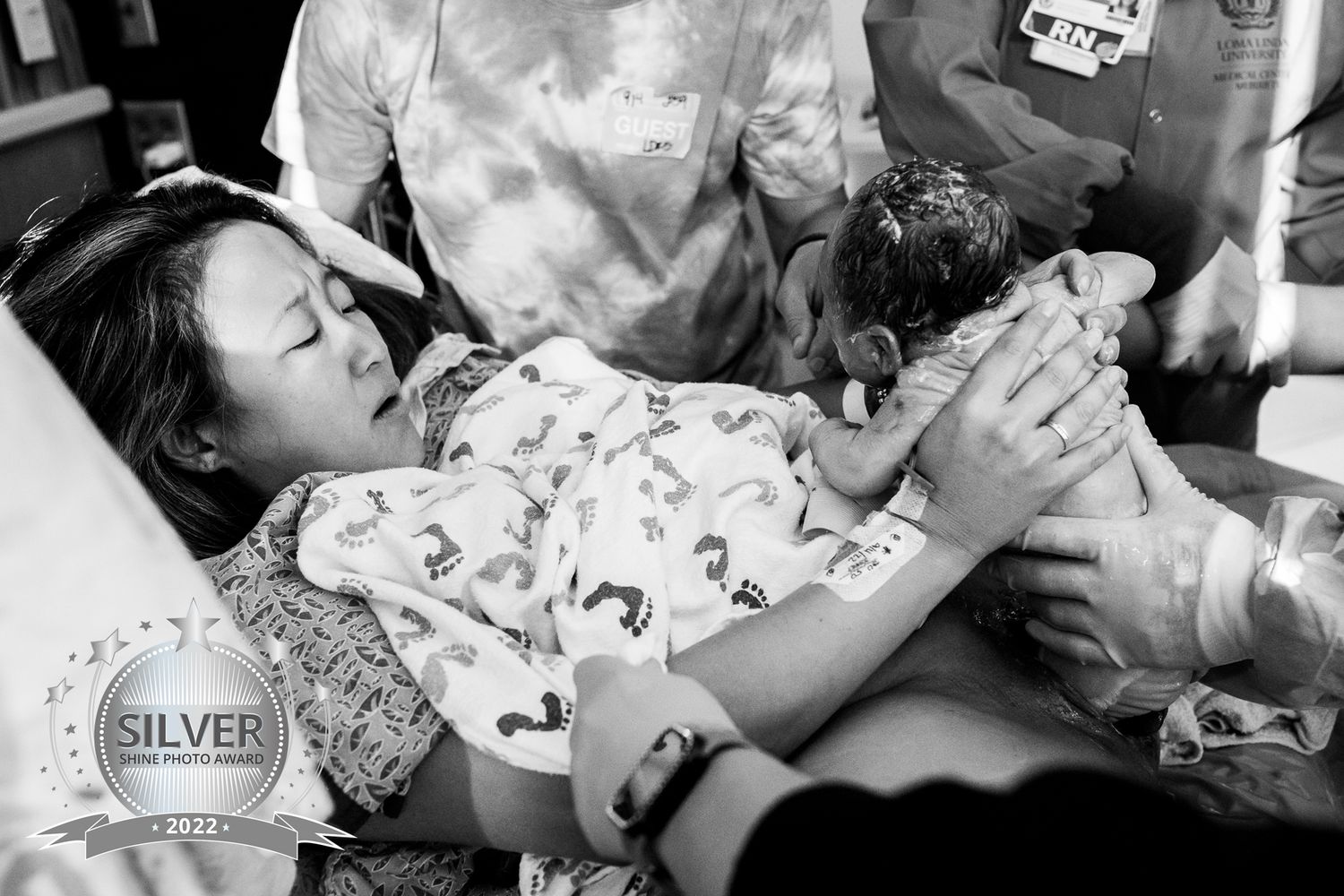 Mother pulls baby to her chest during California hospital birth