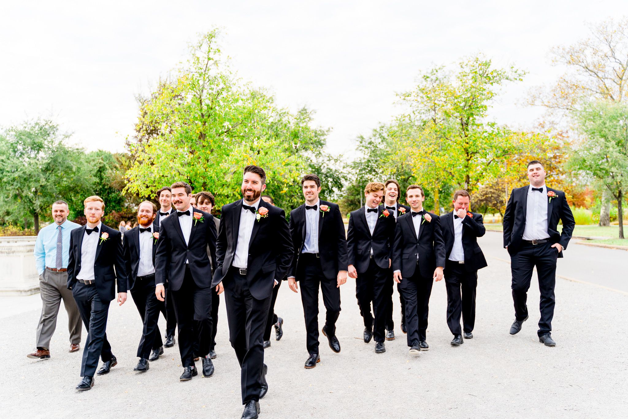 groom and groomsmen portraits at Forest Park STL fall wedding