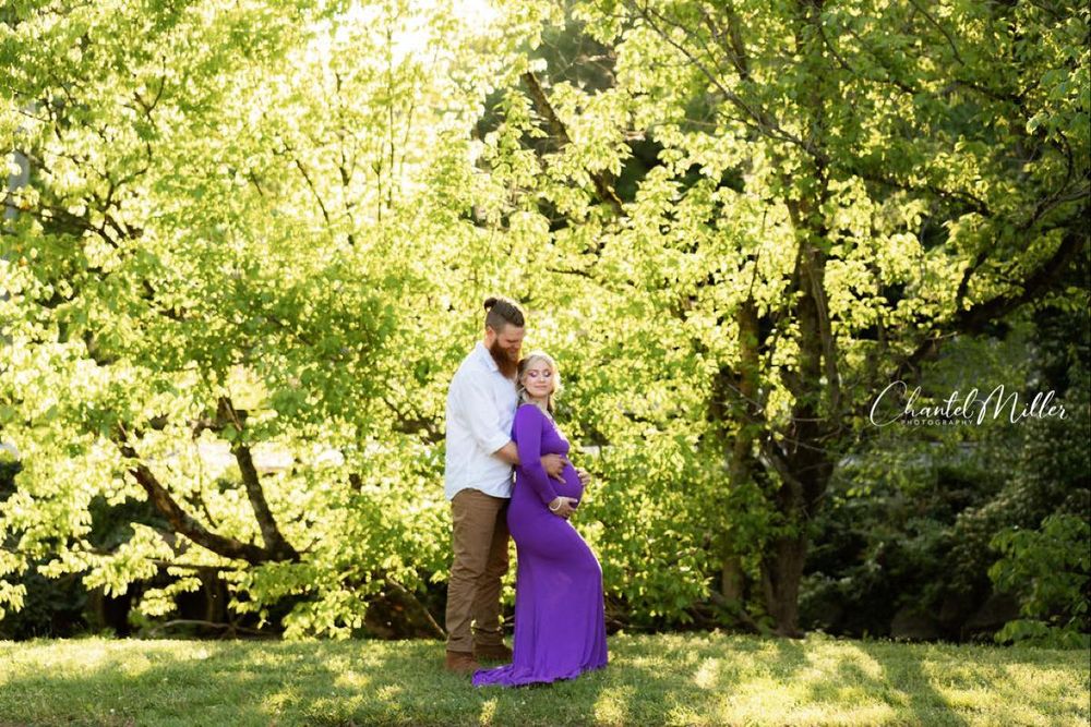 maternity man and woman hugging
