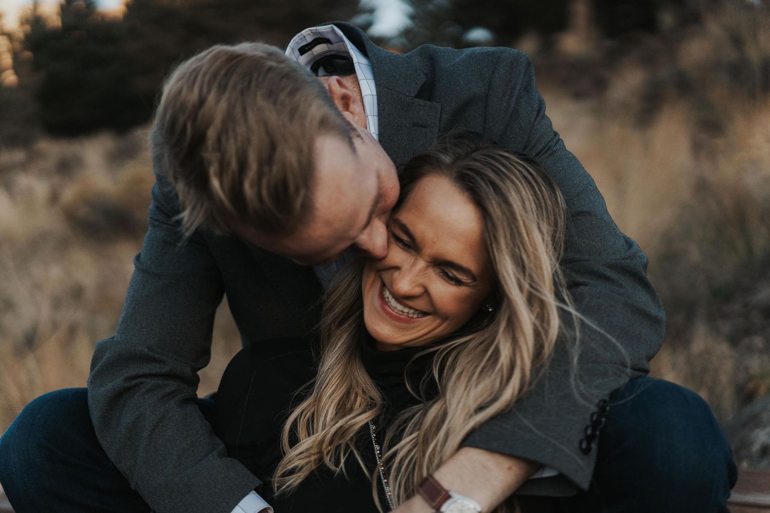 Photo by Kelsie Burke Photography of the couple laughing together in Smith Rock State Park
