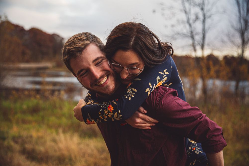 romantic couple piggy back ride