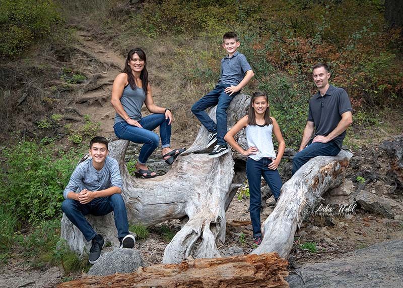 spokane family of five in grey and blue tone colors on Tubbs Hill in Coeur d' Alene photographer luba wold