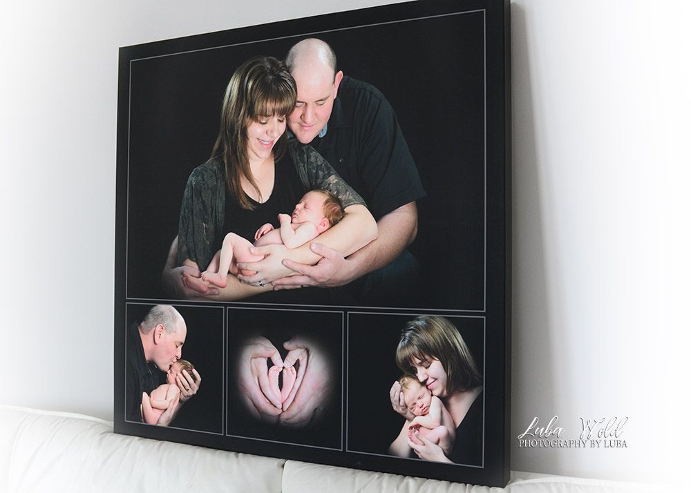 portrait of a family holding their newborn baby canvas wall art display in Post Falls Idaho photographer luba wold