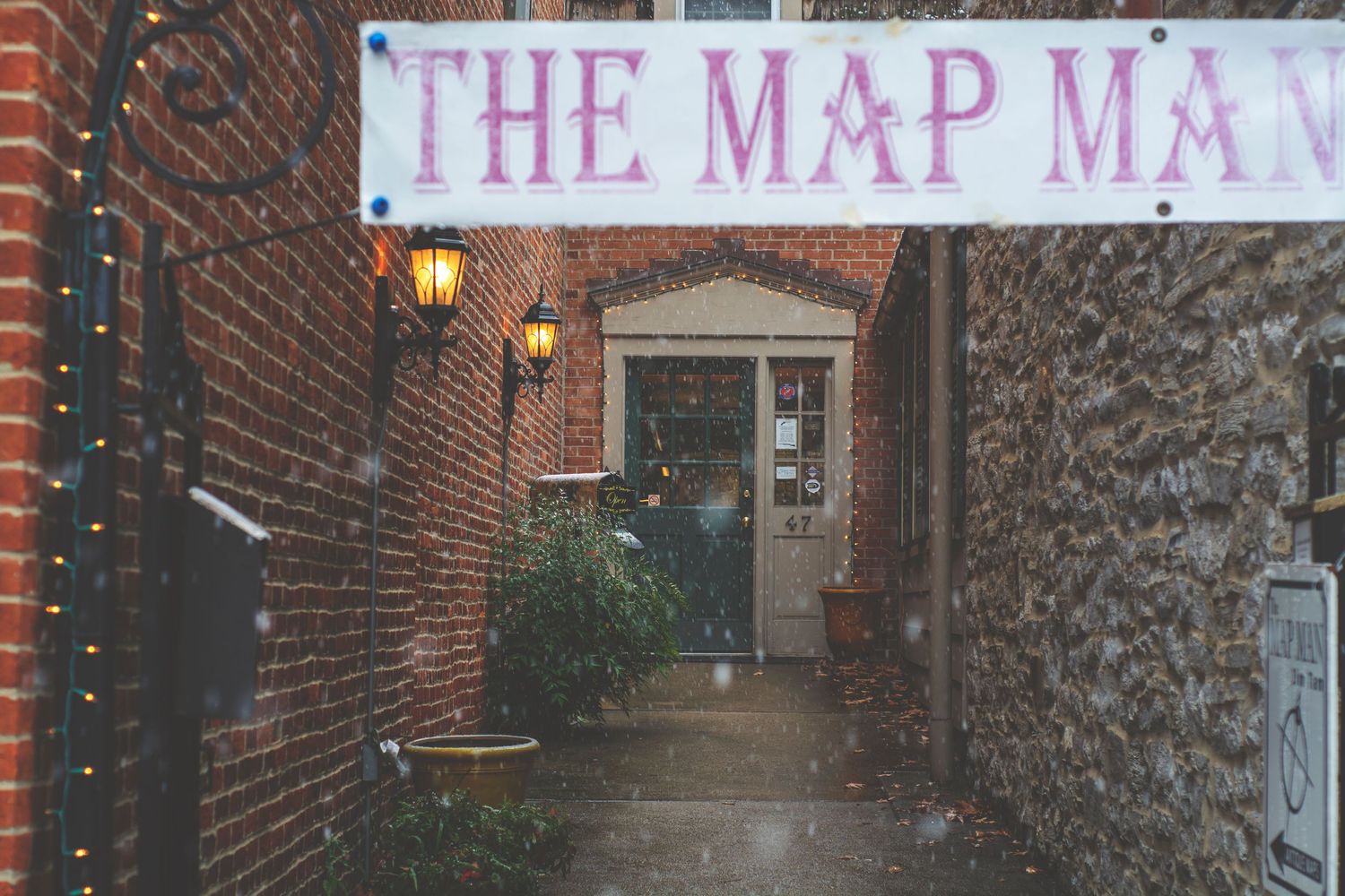A small alley that leads to a shop called The Map Man.