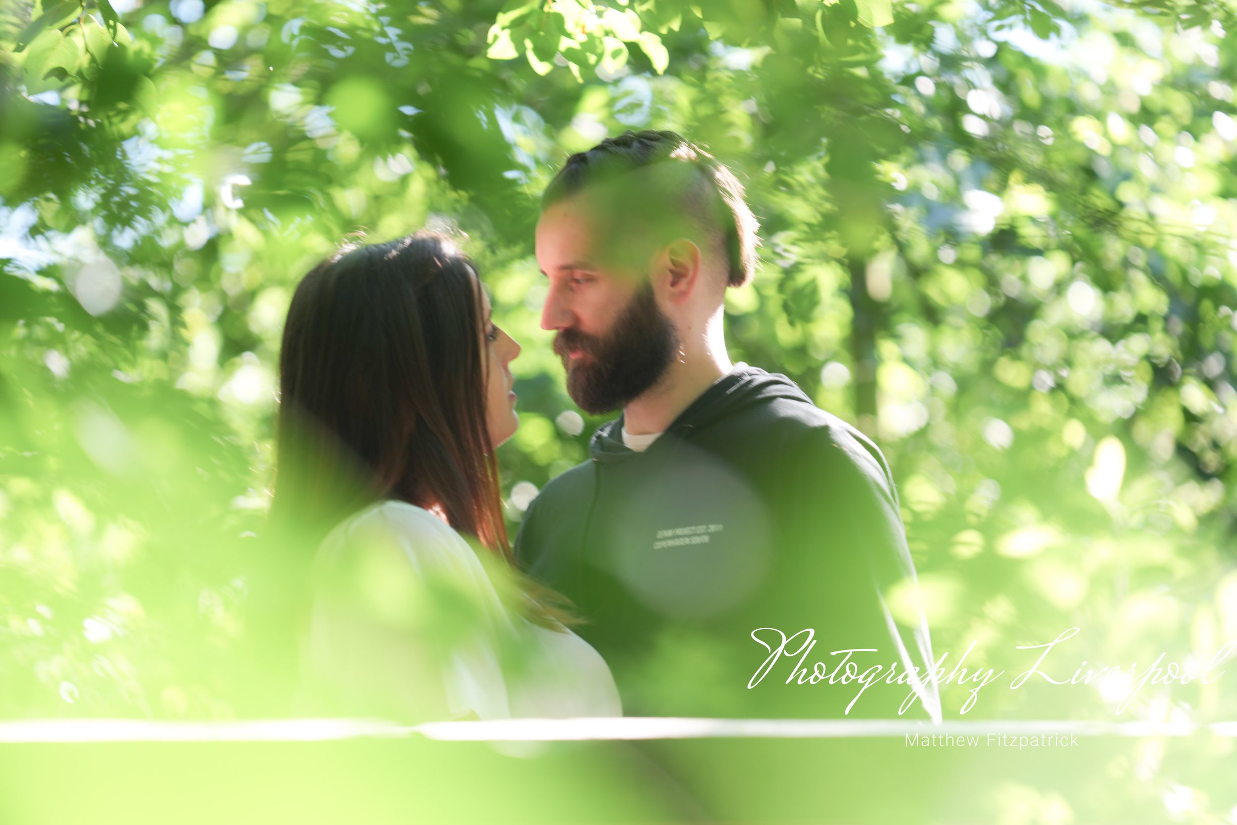 Naturally posed engagement photography at Liverpool Festival Gardens by Photography Liverpool