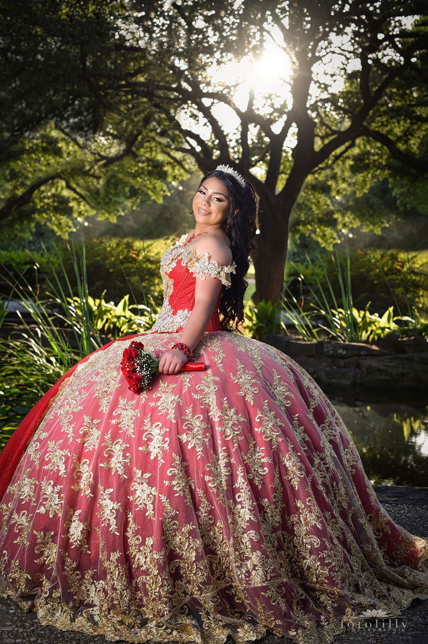 beautiful red and gold quince dress photography session by lake in fort worth texas fotolilly photography