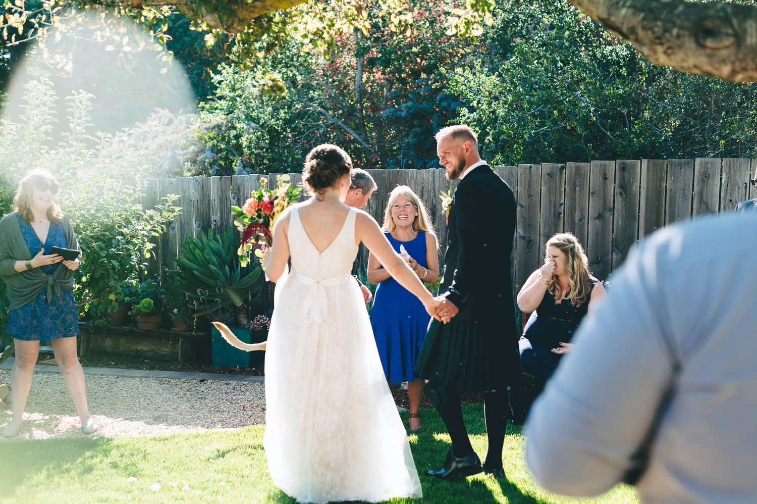Bride and Groom being congratulated by family after their wedding ceremony