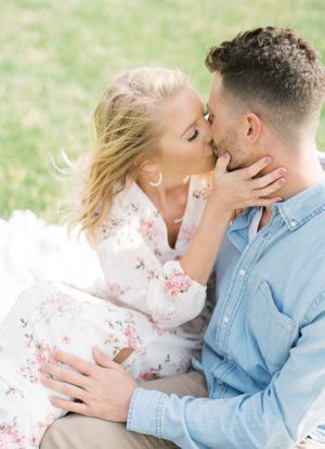 Light and airy film lakeside dock engagement session at Gray's Lake in Des Moines, Iowa