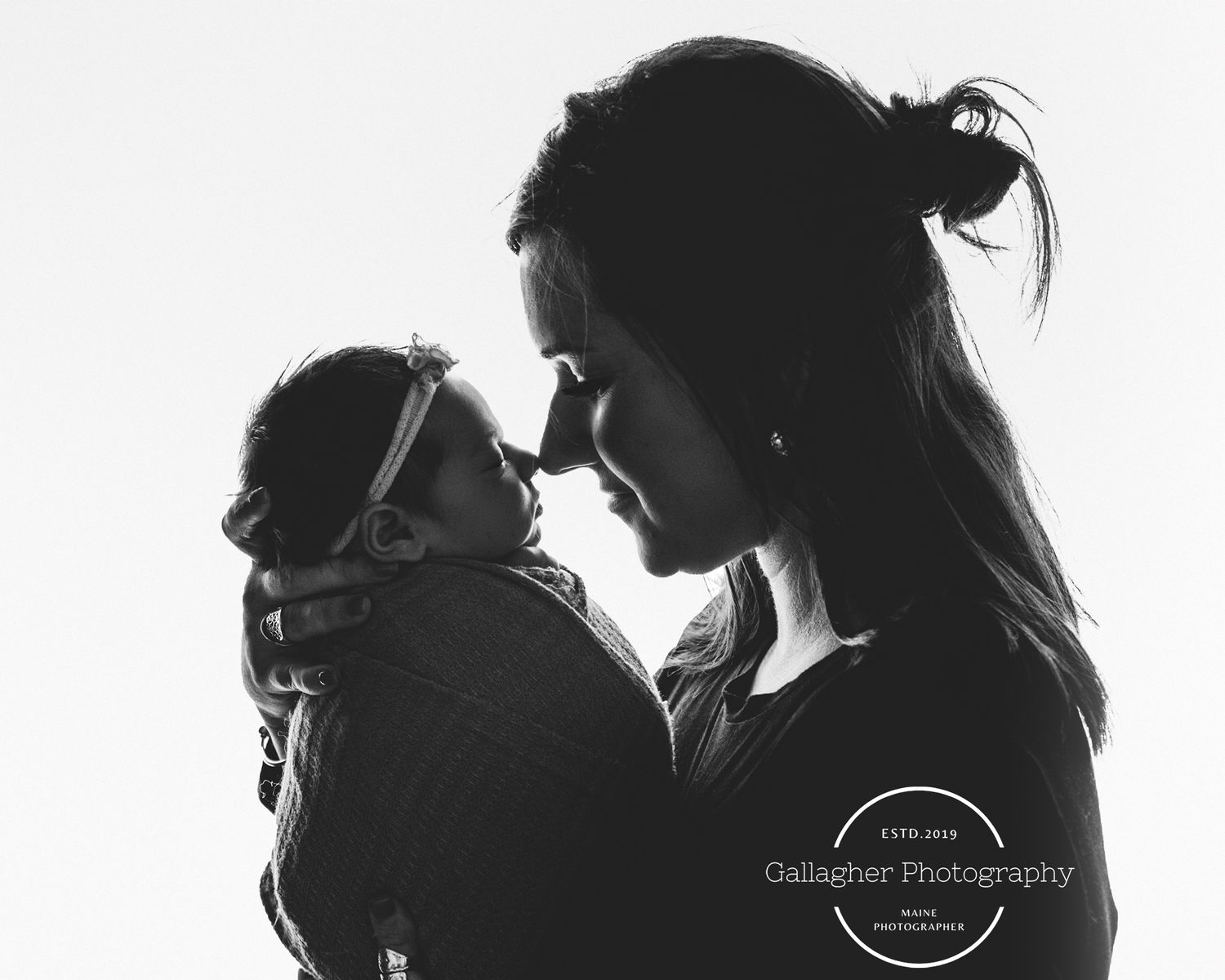 Professional newborn photo with mom