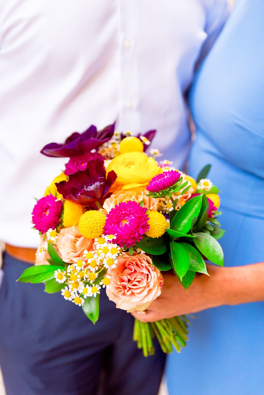 colorful purple pink yellow engagement session bouquet for chicago engagement pictures