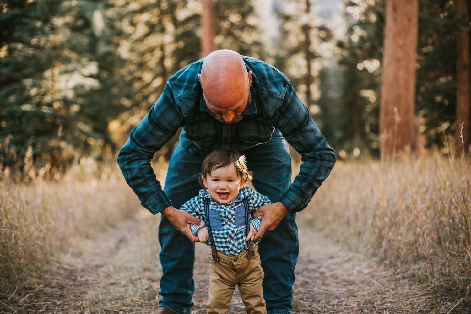 Father and Son play in the Rocky Mountains in Colorado.