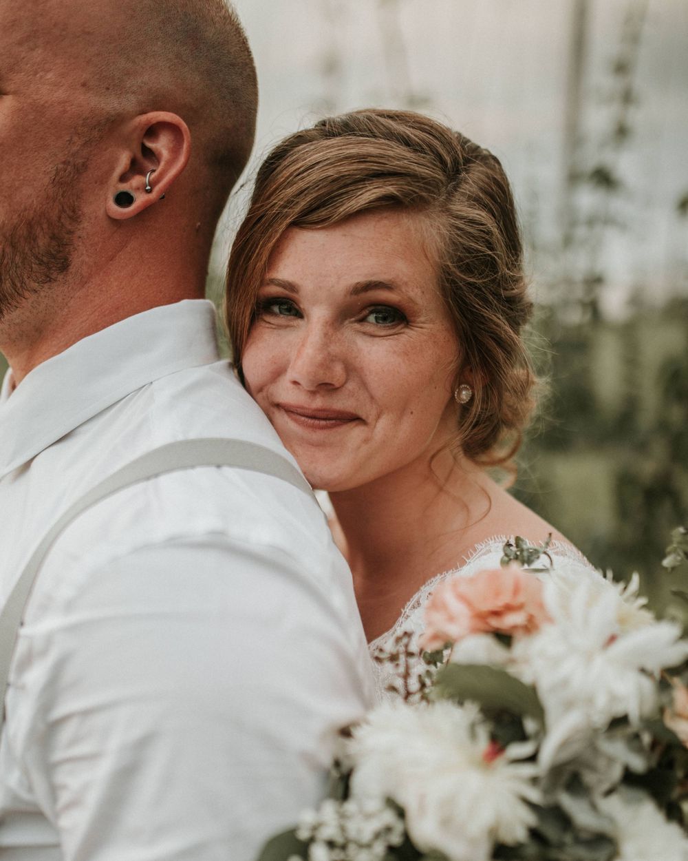 finger lakes bride smiling at the camera
