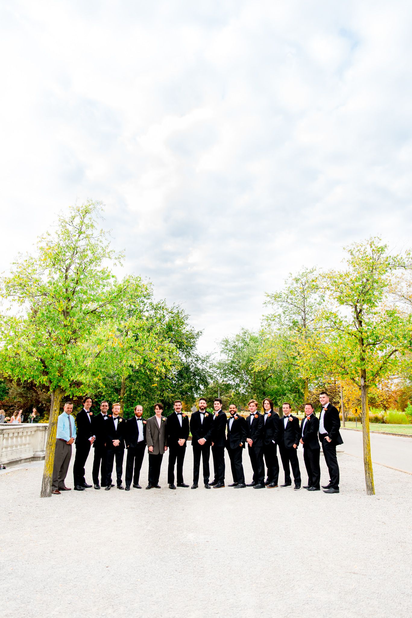 groom and groomsmen portraits at Forest Park STL fall wedding
